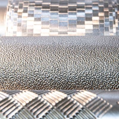 Anilox roller surfaces showing precision-engineered cell structures